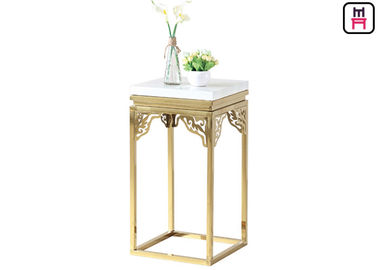 Eleganter quadratischer Marmoredelstahl-Couchtisch, der Eckblumen-Stand schnitzt